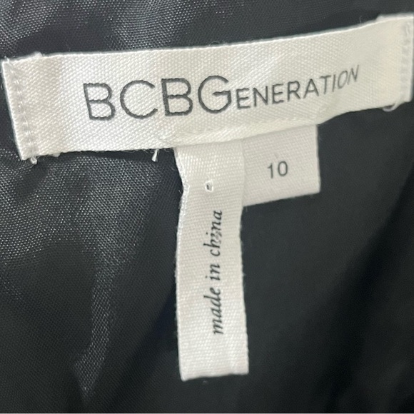 BCBGENERATION Satin Asymmetrical Ruffle Sleeveless Pockets Black Dress Size 10 - Picture 12 of 14